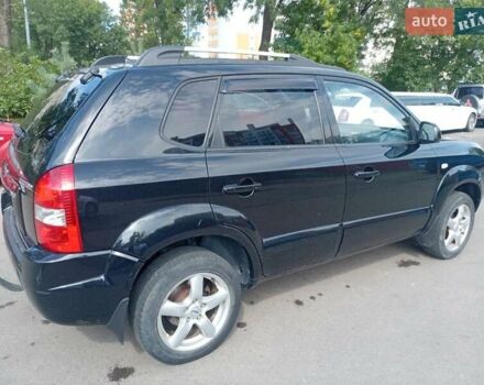 Черный Хендай Туксон, объемом двигателя 1.98 л и пробегом 195 тыс. км за 6981 $, фото 6 на Automoto.ua