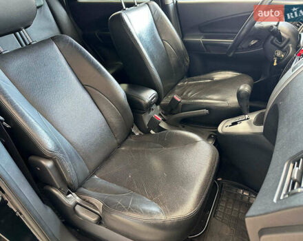 Черный Хендай Туксон, объемом двигателя 2.7 л и пробегом 158 тыс. км за 7940 $, фото 16 на Automoto.ua