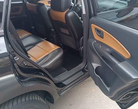 Черный Хендай Туксон, объемом двигателя 2 л и пробегом 255 тыс. км за 8700 $, фото 23 на Automoto.ua