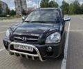 Черный Хендай Туксон, объемом двигателя 1.98 л и пробегом 42 тыс. км за 12000 $, фото 1 на Automoto.ua
