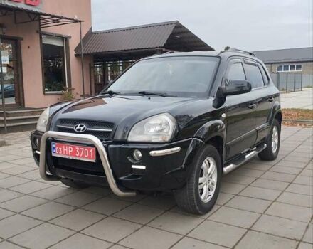 Черный Хендай Туксон, объемом двигателя 1.98 л и пробегом 214 тыс. км за 7700 $, фото 1 на Automoto.ua