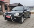 Черный Хендай Туксон, объемом двигателя 1.98 л и пробегом 214 тыс. км за 7700 $, фото 1 на Automoto.ua