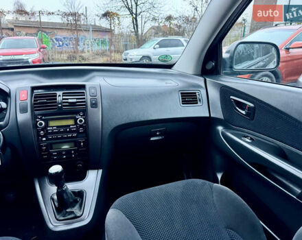 Черный Хендай Туксон, объемом двигателя 1.98 л и пробегом 96 тыс. км за 9900 $, фото 11 на Automoto.ua