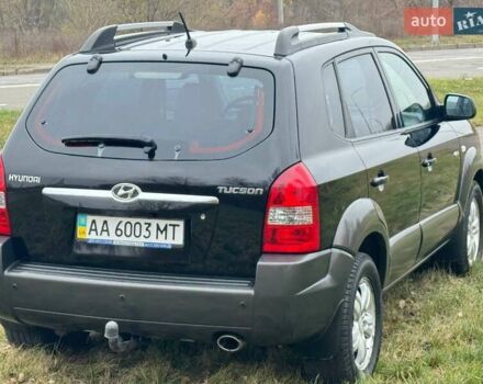 Черный Хендай Туксон, объемом двигателя 2 л и пробегом 148 тыс. км за 9500 $, фото 5 на Automoto.ua