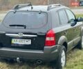 Черный Хендай Туксон, объемом двигателя 2 л и пробегом 148 тыс. км за 9500 $, фото 5 на Automoto.ua