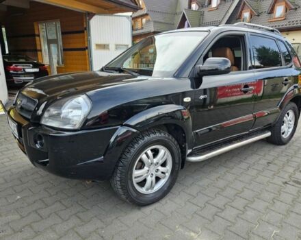 Черный Хендай Туксон, объемом двигателя 2 л и пробегом 287 тыс. км за 2400 $, фото 1 на Automoto.ua