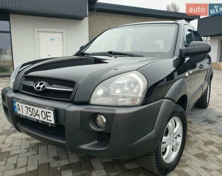 Чорний Хендай Туксон, об'ємом двигуна 2 л та пробігом 225 тис. км за 8000 $, фото 19 на Automoto.ua