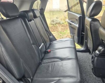 Чорний Хендай Туксон, об'ємом двигуна 1.99 л та пробігом 181 тис. км за 8150 $, фото 6 на Automoto.ua