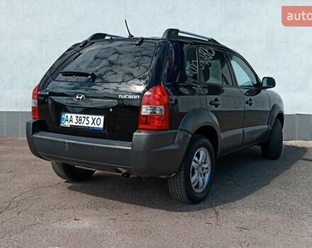 Чорний Хендай Туксон, об'ємом двигуна 1.98 л та пробігом 220 тис. км за 8500 $, фото 6 на Automoto.ua