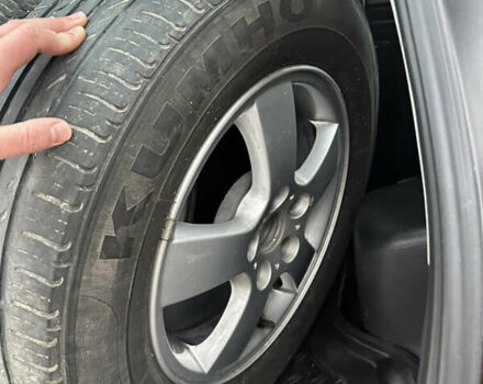 Черный Хендай Туксон, объемом двигателя 2 л и пробегом 136 тыс. км за 8500 $, фото 34 на Automoto.ua