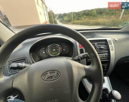 Чорний Хендай Туксон, об'ємом двигуна 1.98 л та пробігом 185 тис. км за 7199 $, фото 65 на Automoto.ua