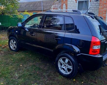 Черный Хендай Туксон, объемом двигателя 2 л и пробегом 187 тыс. км за 7900 $, фото 4 на Automoto.ua