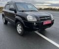 Черный Хендай Туксон, объемом двигателя 2 л и пробегом 253 тыс. км за 8299 $, фото 2 на Automoto.ua