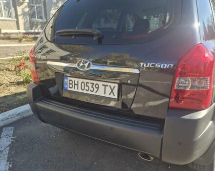Черный Хендай Туксон, объемом двигателя 1.98 л и пробегом 93 тыс. км за 11800 $, фото 8 на Automoto.ua