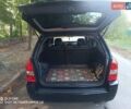 Чорний Хендай Туксон, об'ємом двигуна 1.98 л та пробігом 230 тис. км за 6950 $, фото 6 на Automoto.ua