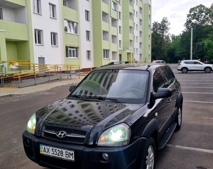 Черный Хендай Туксон, объемом двигателя 2 л и пробегом 152 тыс. км за 7800 $, фото 4 на Automoto.ua