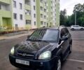 Черный Хендай Туксон, объемом двигателя 2 л и пробегом 152 тыс. км за 7800 $, фото 4 на Automoto.ua