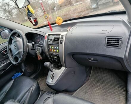 Черный Хендай Туксон, объемом двигателя 2 л и пробегом 276 тыс. км за 8500 $, фото 5 на Automoto.ua