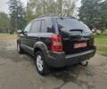 Чорний Хендай Туксон, об'ємом двигуна 2 л та пробігом 186 тис. км за 8300 $, фото 8 на Automoto.ua