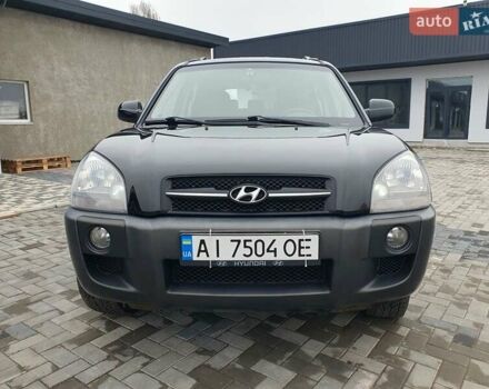 Чорний Хендай Туксон, об'ємом двигуна 2 л та пробігом 225 тис. км за 8000 $, фото 13 на Automoto.ua