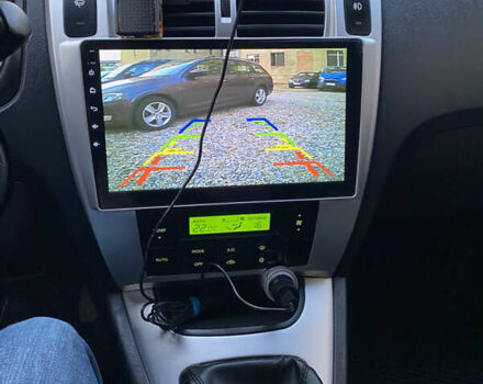 Черный Хендай Туксон, объемом двигателя 1.98 л и пробегом 254 тыс. км за 7700 $, фото 22 на Automoto.ua