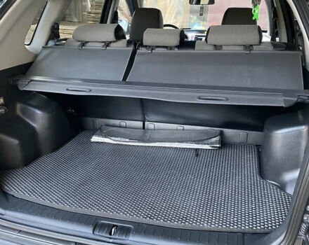 Черный Хендай Туксон, объемом двигателя 1.98 л и пробегом 254 тыс. км за 7700 $, фото 7 на Automoto.ua