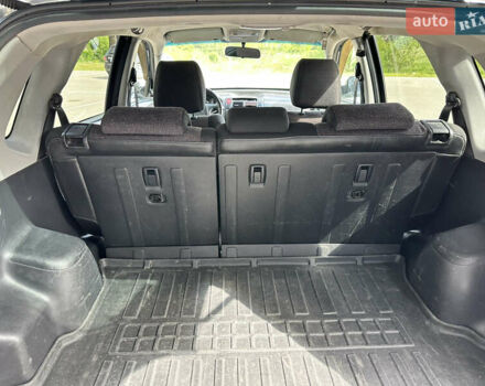 Чорний Хендай Туксон, об'ємом двигуна 1.98 л та пробігом 279 тис. км за 8200 $, фото 19 на Automoto.ua