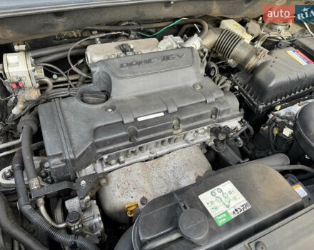 Черный Хендай Туксон, объемом двигателя 1.98 л и пробегом 196 тыс. км за 7999 $, фото 22 на Automoto.ua