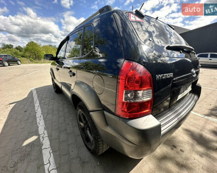 Чорний Хендай Туксон, об'ємом двигуна 1.98 л та пробігом 279 тис. км за 8200 $, фото 12 на Automoto.ua