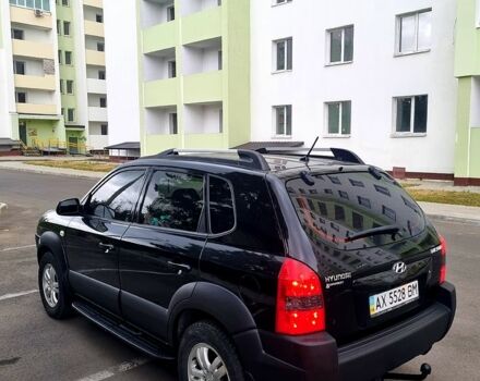 Черный Хендай Туксон, объемом двигателя 2 л и пробегом 152 тыс. км за 7800 $, фото 1 на Automoto.ua