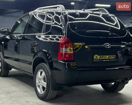 Чорний Хендай Туксон, об'ємом двигуна 1.98 л та пробігом 224 тис. км за 7800 $, фото 3 на Automoto.ua
