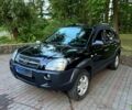 Чорний Хендай Туксон, об'ємом двигуна 2 л та пробігом 267 тис. км за 8200 $, фото 1 на Automoto.ua
