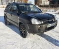Чорний Хендай Туксон, об'ємом двигуна 1.98 л та пробігом 185 тис. км за 7800 $, фото 1 на Automoto.ua