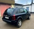Черный Хендай Туксон, объемом двигателя 2 л и пробегом 215 тыс. км за 6700 $, фото 2 на Automoto.ua