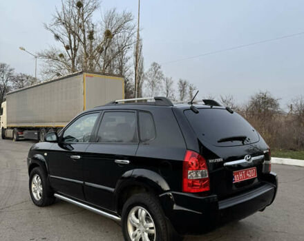 Черный Хендай Туксон, объемом двигателя 2 л и пробегом 210 тыс. км за 7850 $, фото 11 на Automoto.ua