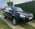 Черный Хендай Туксон, объемом двигателя 2 л и пробегом 255 тыс. км за 8300 $, фото 1 на Automoto.ua
