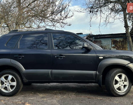 Чорний Хендай Туксон, об'ємом двигуна 2 л та пробігом 240 тис. км за 8500 $, фото 4 на Automoto.ua
