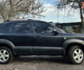 Чорний Хендай Туксон, об'ємом двигуна 2 л та пробігом 240 тис. км за 8500 $, фото 4 на Automoto.ua