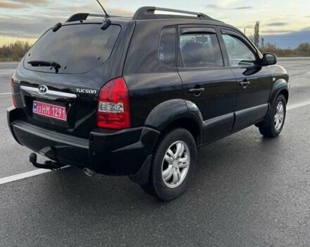 Черный Хендай Туксон, объемом двигателя 2 л и пробегом 253 тыс. км за 8299 $, фото 21 на Automoto.ua