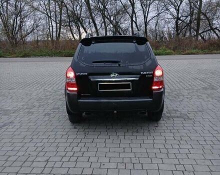 Черный Хендай Туксон, объемом двигателя 2 л и пробегом 230 тыс. км за 8000 $, фото 13 на Automoto.ua