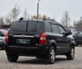 Чорний Хендай Туксон, об'ємом двигуна 2 л та пробігом 204 тис. км за 8650 $, фото 1 на Automoto.ua