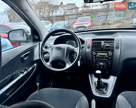 Черный Хендай Туксон, объемом двигателя 1.98 л и пробегом 96 тыс. км за 9900 $, фото 10 на Automoto.ua