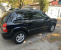 Черный Хендай Туксон, объемом двигателя 1.98 л и пробегом 260 тыс. км за 7777 $, фото 6 на Automoto.ua