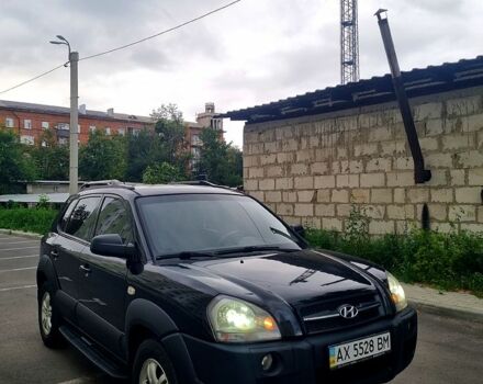 Черный Хендай Туксон, объемом двигателя 2 л и пробегом 152 тыс. км за 7800 $, фото 3 на Automoto.ua