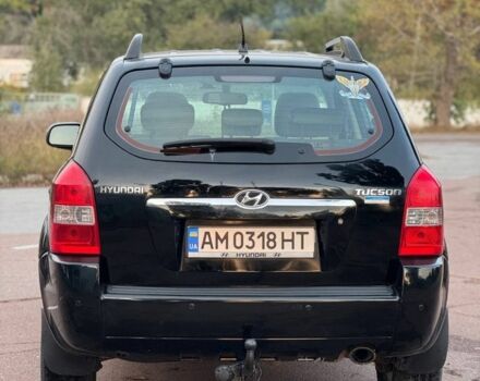 Черный Хендай Туксон, объемом двигателя 2 л и пробегом 353 тыс. км за 6800 $, фото 4 на Automoto.ua