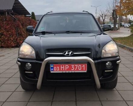 Черный Хендай Туксон, объемом двигателя 1.98 л и пробегом 214 тыс. км за 7700 $, фото 3 на Automoto.ua