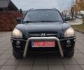 Черный Хендай Туксон, объемом двигателя 1.98 л и пробегом 214 тыс. км за 7700 $, фото 3 на Automoto.ua