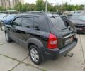 Черный Хендай Туксон, объемом двигателя 2 л и пробегом 214 тыс. км за 7690 $, фото 3 на Automoto.ua