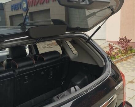 Черный Хендай Туксон, объемом двигателя 1.98 л и пробегом 214 тыс. км за 7700 $, фото 16 на Automoto.ua