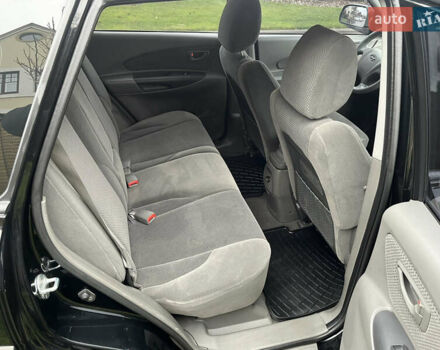 Черный Хендай Туксон, объемом двигателя 2 л и пробегом 107 тыс. км за 8900 $, фото 29 на Automoto.ua